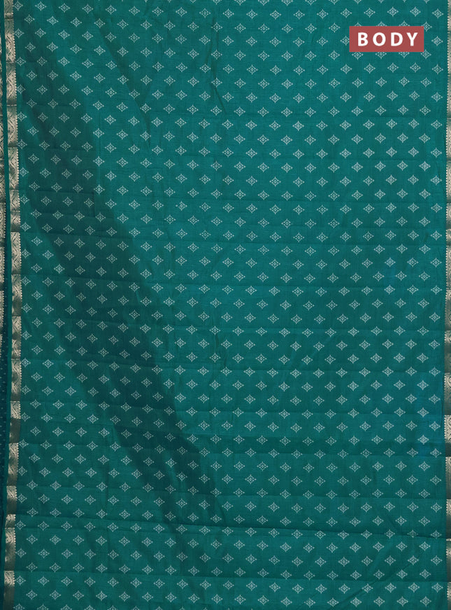 Semi raw silk saree teal green with allover butta prints and zari woven border