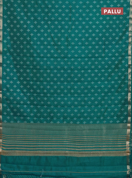 Semi raw silk saree teal green with allover butta prints and zari woven border