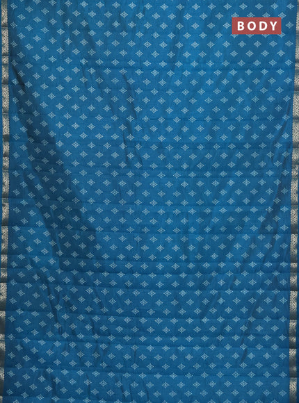 Semi raw silk saree cs blue with allover butta prints and zari woven border