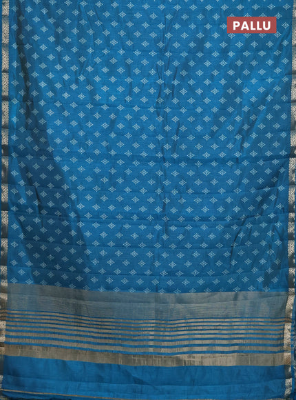 Semi raw silk saree cs blue with allover butta prints and zari woven border