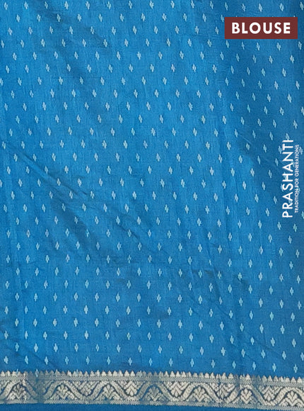 Semi raw silk saree cs blue with allover butta prints and zari woven border