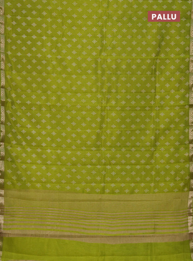 Semi raw silk saree light green with allover butta prints and zari woven border