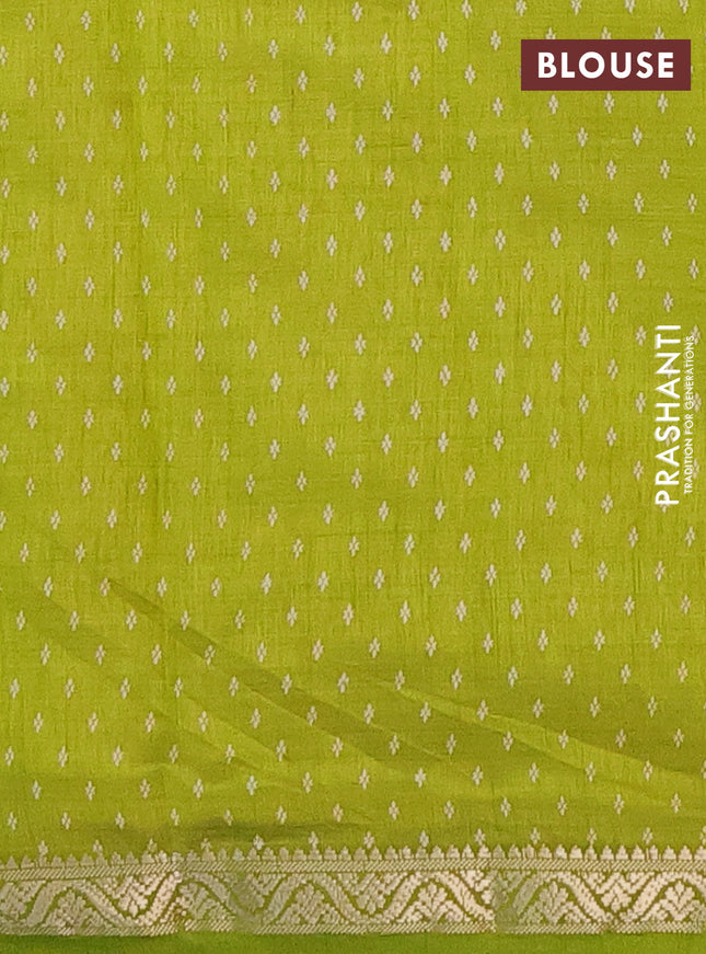 Semi raw silk saree light green with allover butta prints and zari woven border