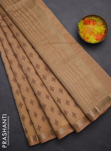 Semi raw silk saree sandal with allover butta prints and zari woven border