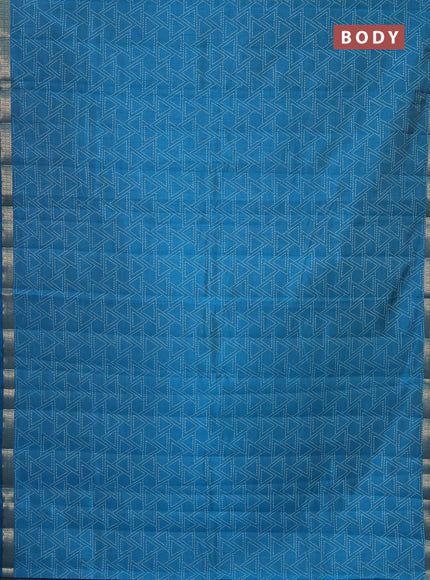 Semi raw silk saree cs blue with allover geometric prints and zari woven border