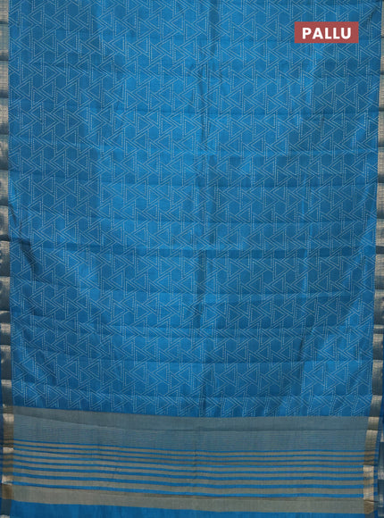 Semi raw silk saree cs blue with allover geometric prints and zari woven border