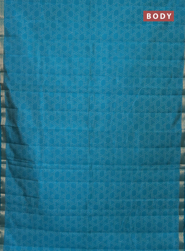 Semi raw silk saree teal blue with allover geometric prints and zari woven border