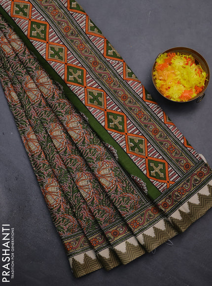 Muslin cotton saree green with allover prints and printed border