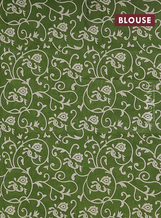 Muslin cotton saree green with allover prints and printed border