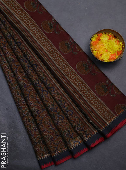 Muslin cotton saree dark mustard and black with allover prints and woven border
