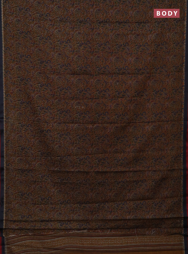 Muslin cotton saree dark mustard and black with allover prints and woven border