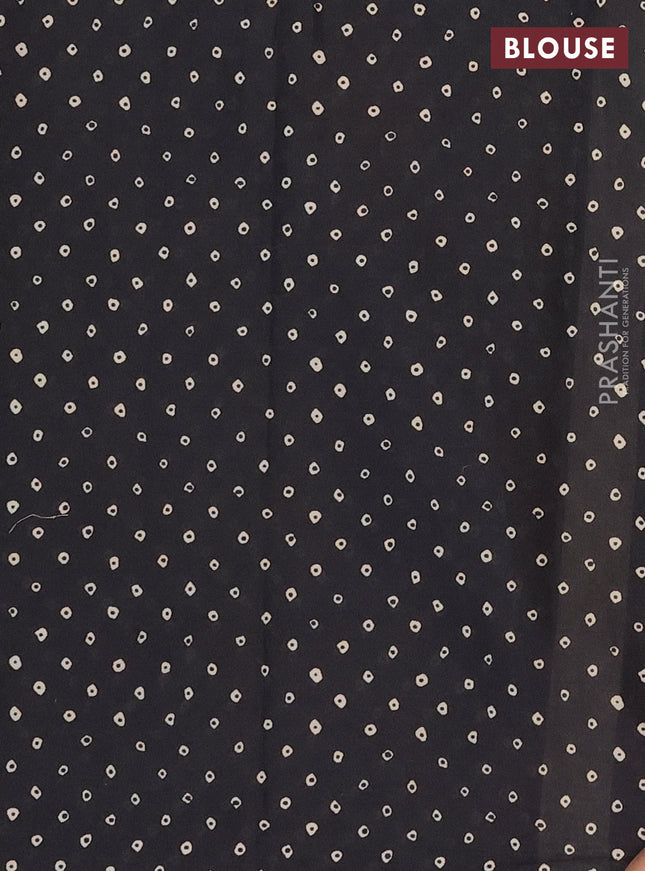 Muslin cotton saree maroon and black with allover ajrakh prints and printed border