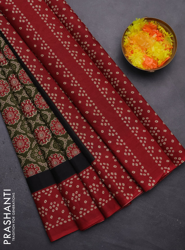 Muslin cotton saree green and maroon with allover ajrakh prints and printed border