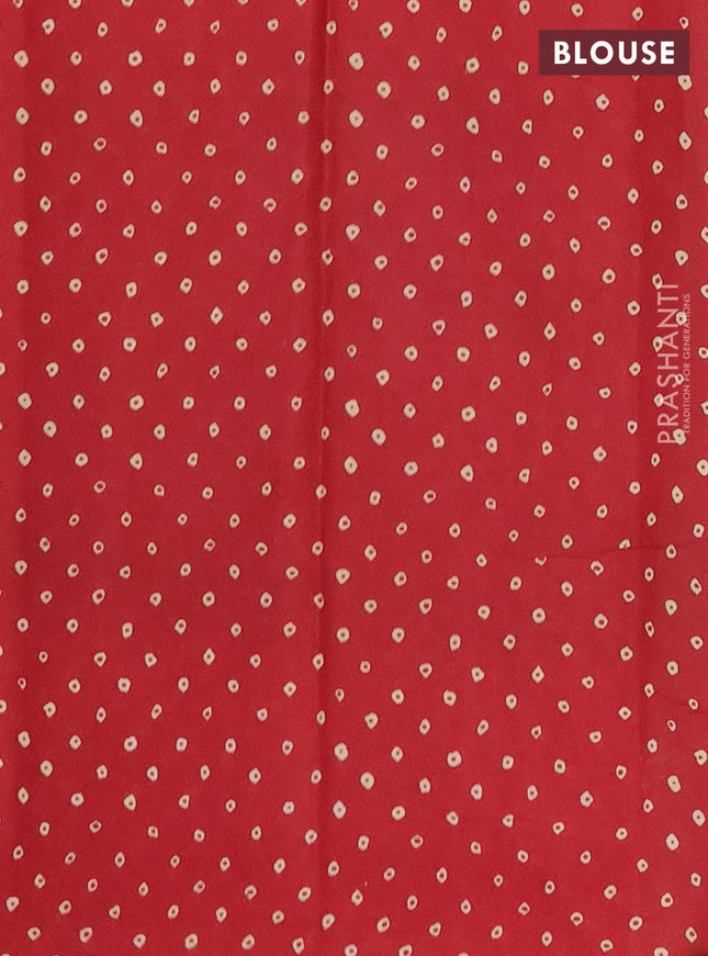 Muslin cotton saree green and maroon with allover ajrakh prints and printed border