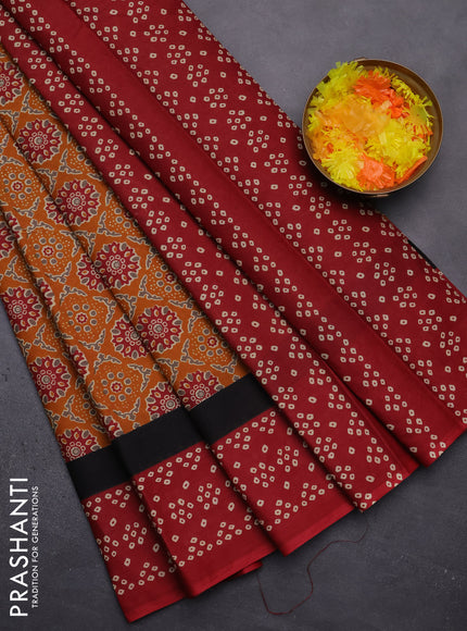 Muslin cotton saree mustard yellow and red with allover ajrakh prints and printed border