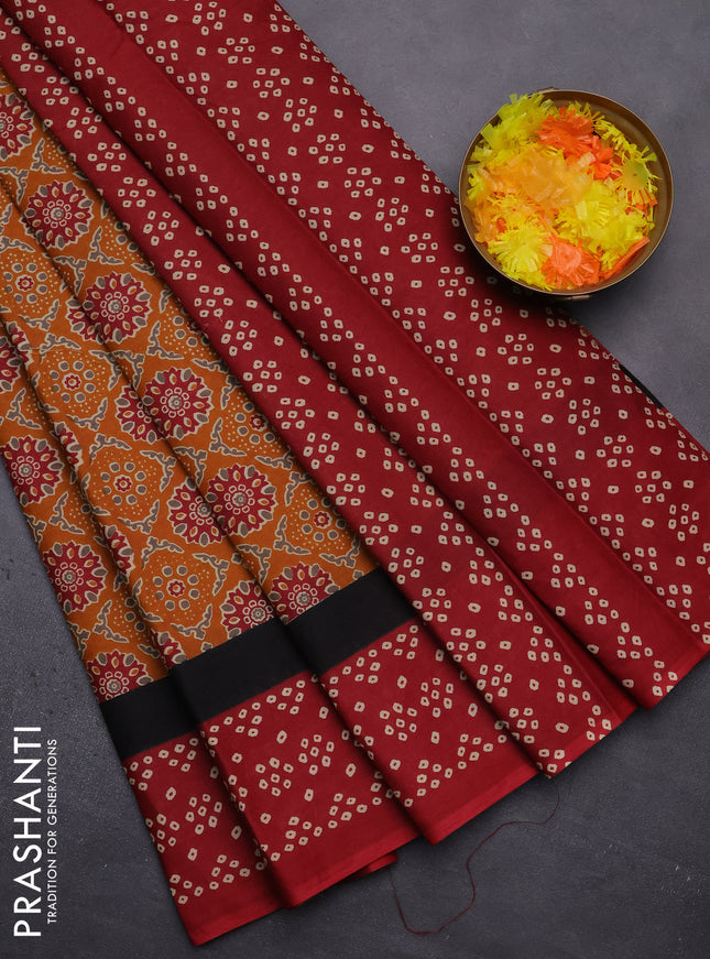Muslin cotton saree mustard yellow and red with allover ajrakh prints and printed border