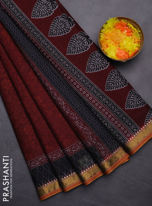 Muslin cotton saree maroon and black with allover prints and zari woven border