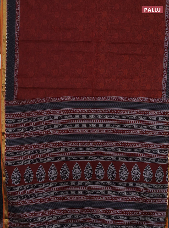 Muslin cotton saree maroon and black with allover prints and zari woven border