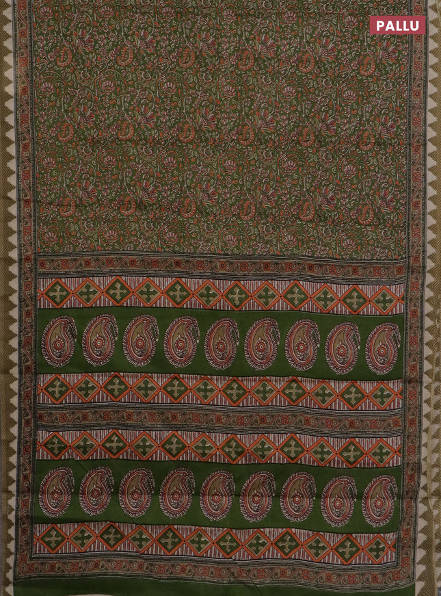 Muslin cotton saree green with allover prints and printed border