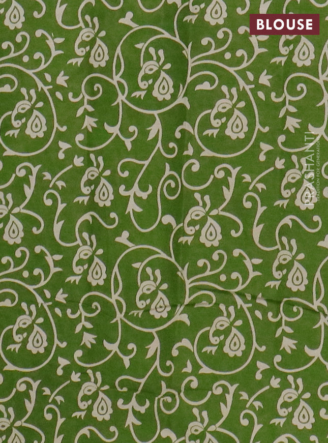 Muslin cotton saree green with allover prints and printed border