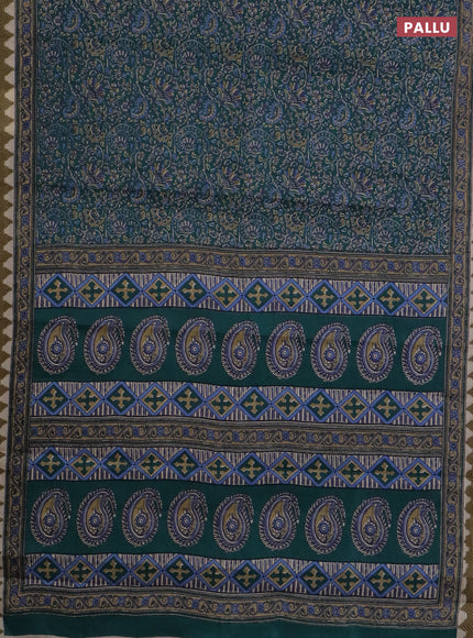 Muslin cotton saree peacock green with allover prints and printed border