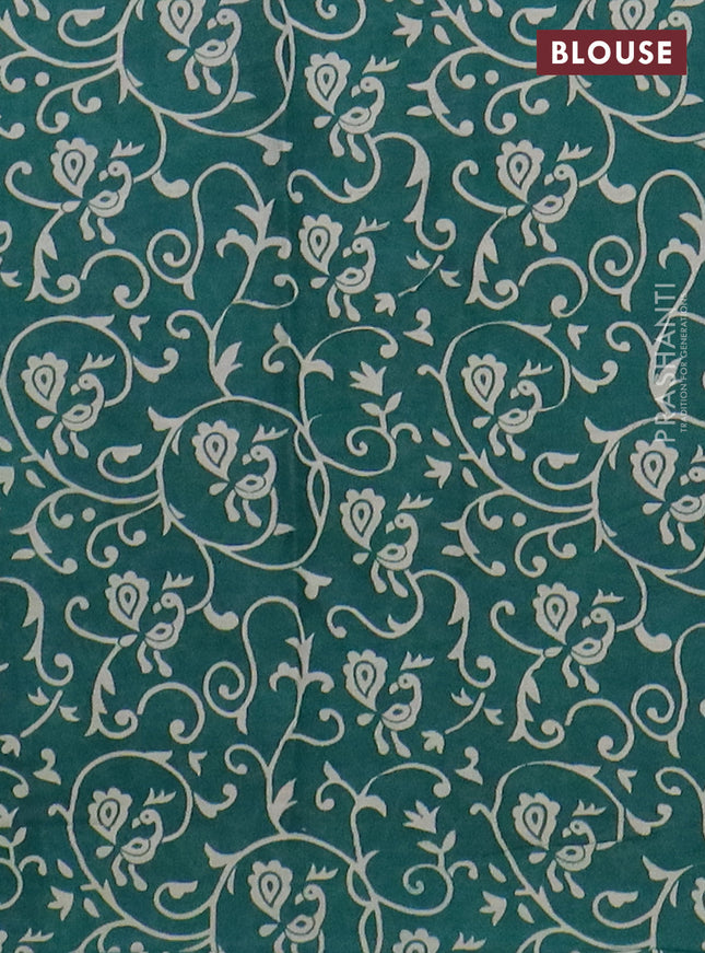 Muslin cotton saree peacock green with allover prints and printed border