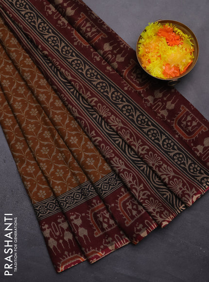 Muslin cotton saree dark mustard and maroon with allover prints and printed border