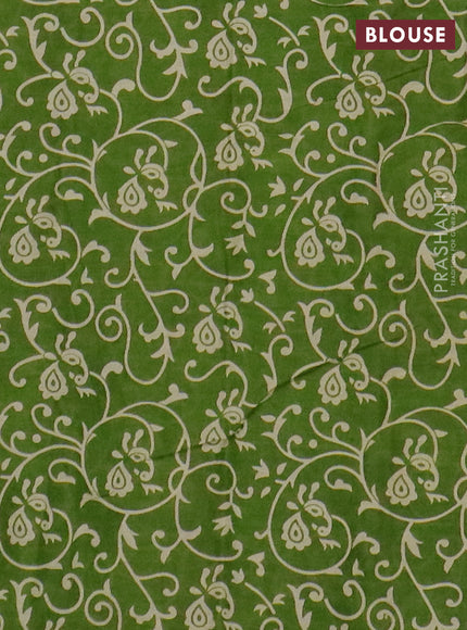 Muslin cotton saree green with allover prints and printed border