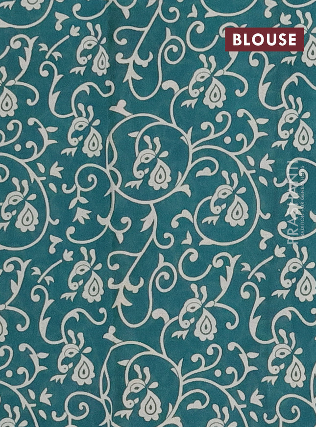 Muslin cotton saree peacock green with allover prints and printed border