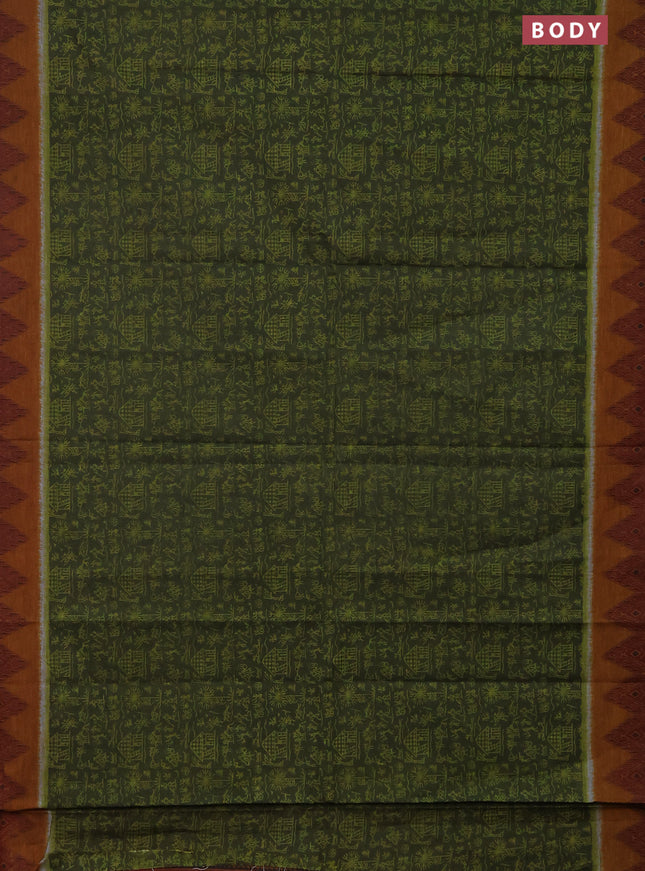 Muslin cotton saree sap green and dark mustard with allover warli prints and zari woven border