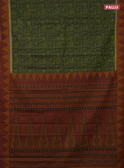 Muslin cotton saree sap green and dark mustard with allover warli prints and zari woven border