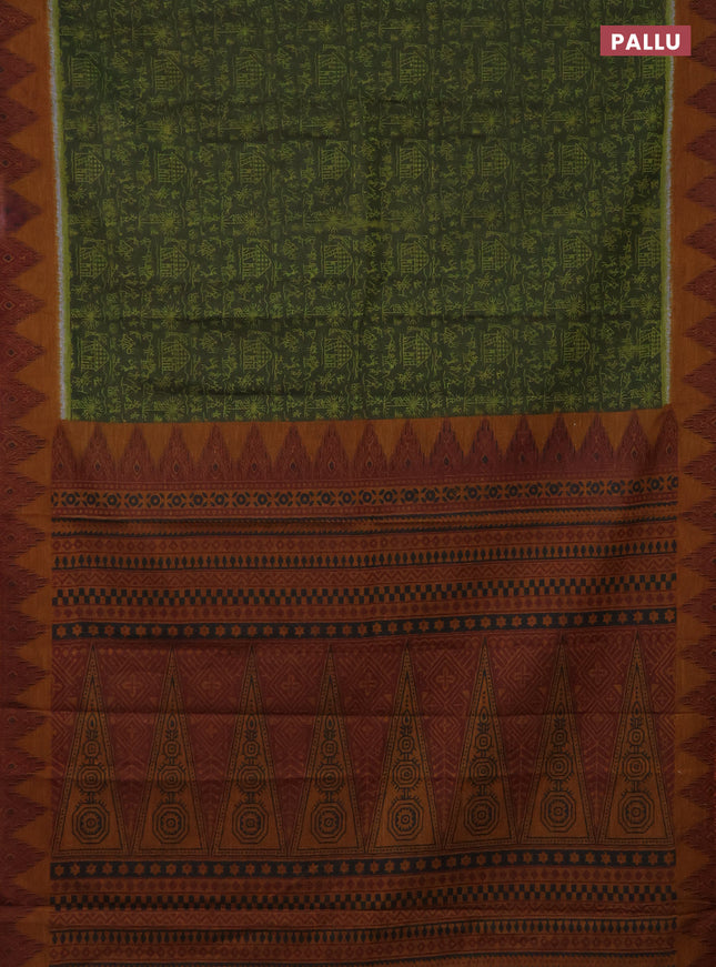 Muslin cotton saree sap green and dark mustard with allover warli prints and zari woven border