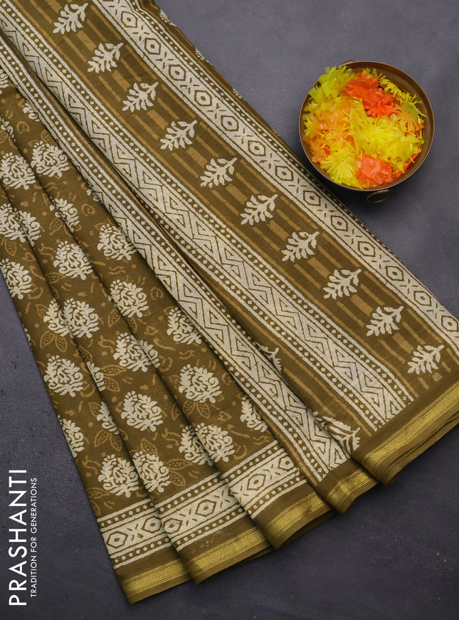 Muslin cotton saree mehendi green with butta prints and zari woven border