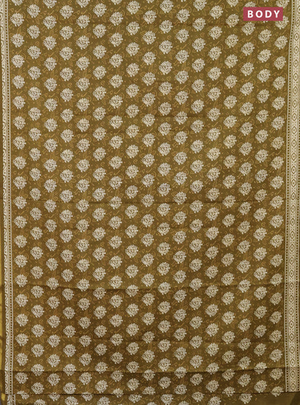 Muslin cotton saree mehendi green with butta prints and zari woven border