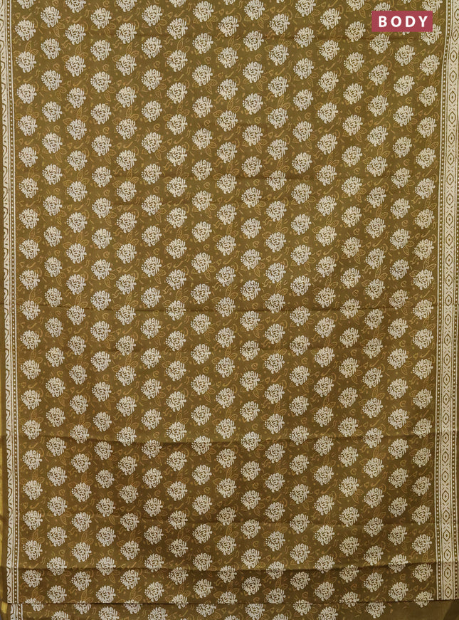 Muslin cotton saree mehendi green with butta prints and zari woven border