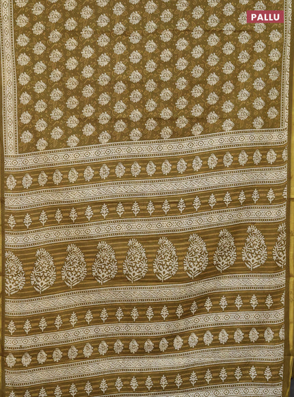 Muslin cotton saree mehendi green with butta prints and zari woven border