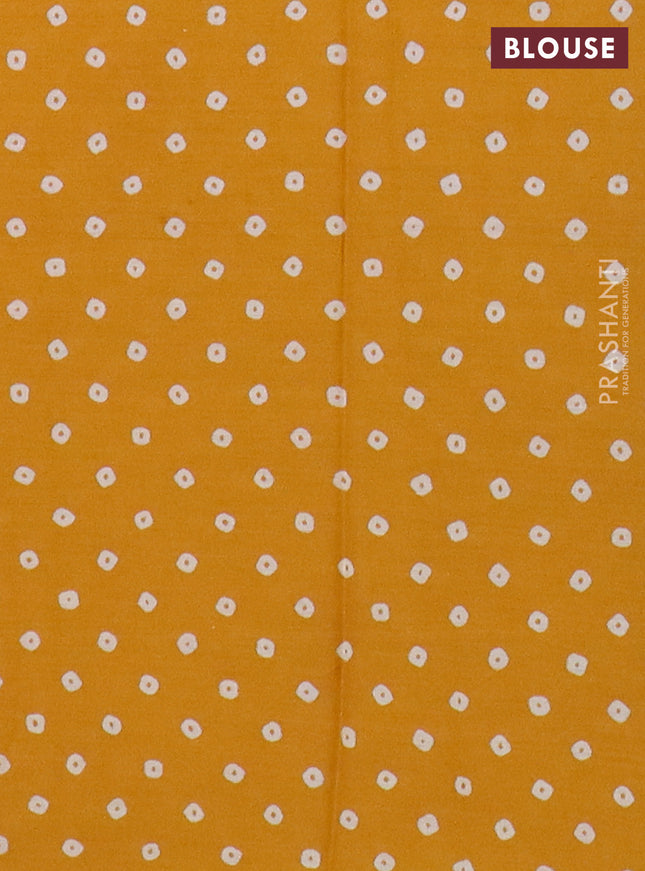 Muslin cotton saree mustard yellow with allover floral prints and printed border