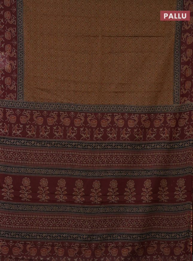Muslin cotton saree mustard shade and deep maroon with allover prints and printed border