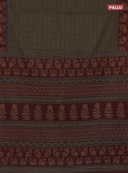 Muslin cotton saree dark sap green and deep maroon with allover prints and printed border