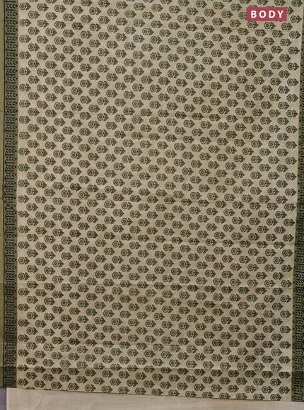 Muslin cotton saree beige and pastel green with floral butta prints and printed border