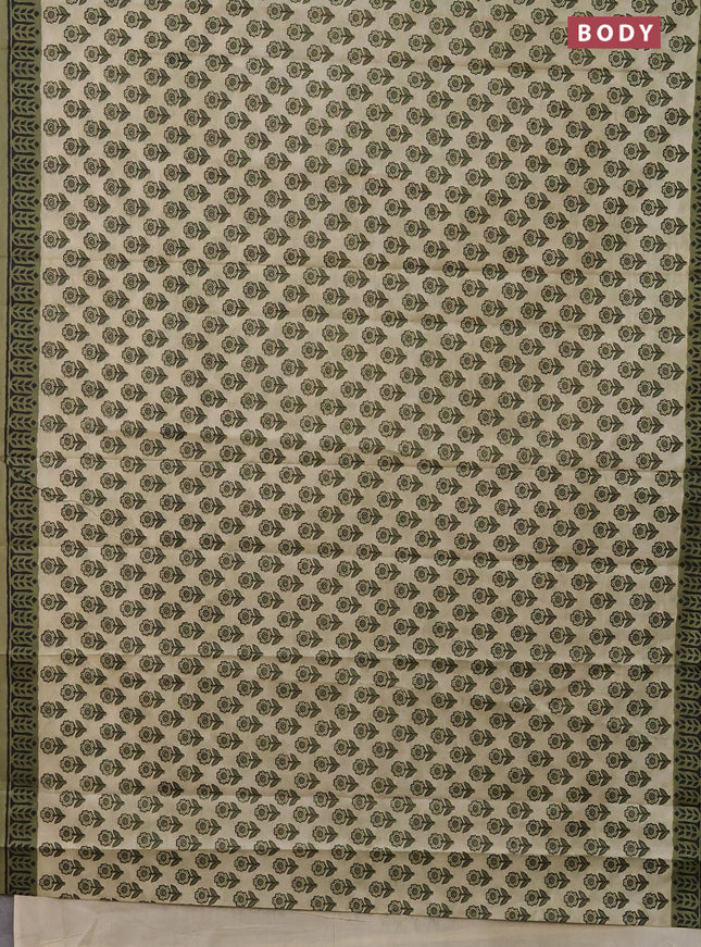 Muslin cotton saree beige and pastel green with floral butta prints and printed border