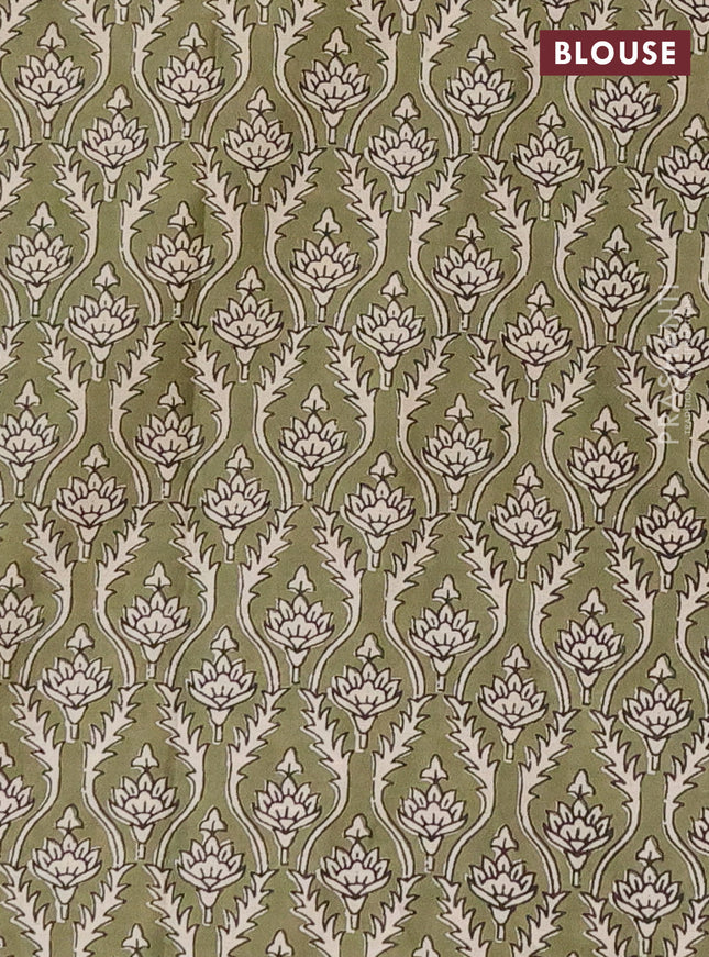 Muslin cotton saree beige and pastel green with floral butta prints and printed border