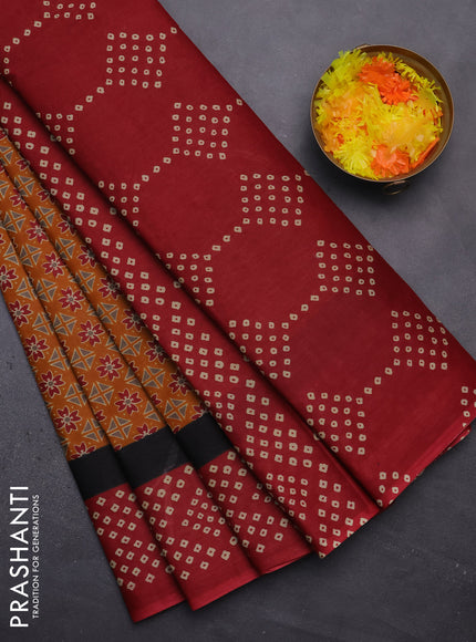 Muslin cotton saree mustard yellow and maroon with ajrakh prints and printed border