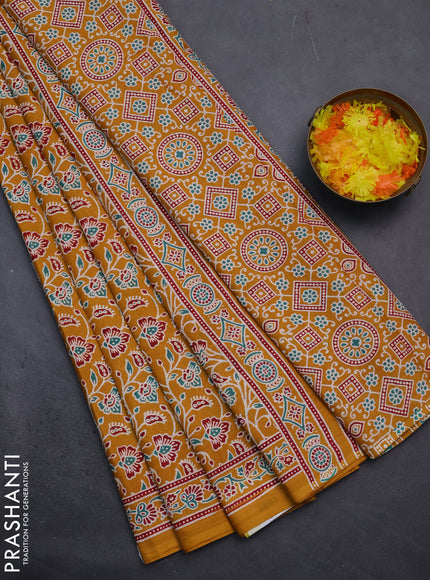 Muslin cotton saree mustard yellow with allover kalamkari prints and printed border