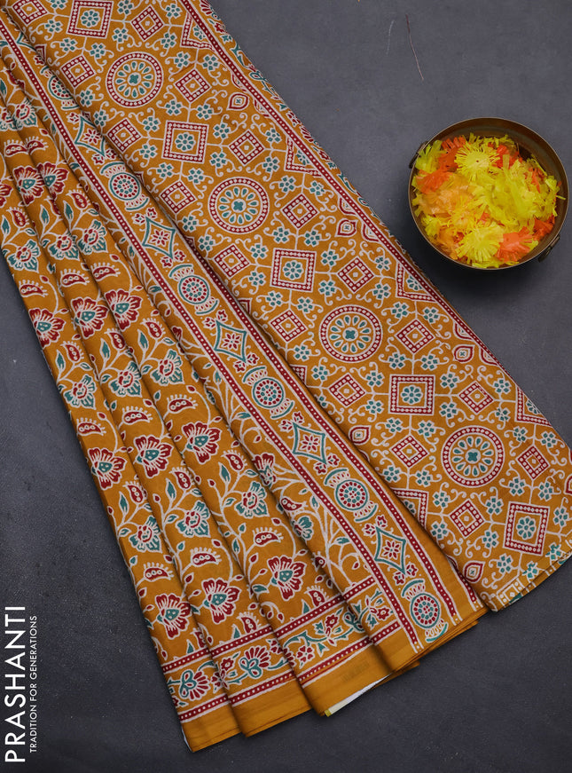 Muslin cotton saree mustard yellow with allover kalamkari prints and printed border
