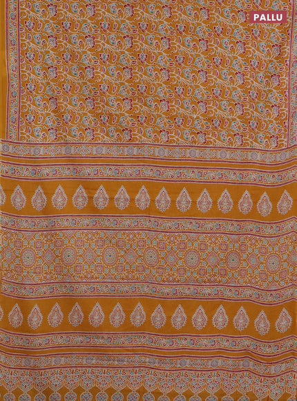 Muslin cotton saree mustard yellow with allover kalamkari prints and printed border