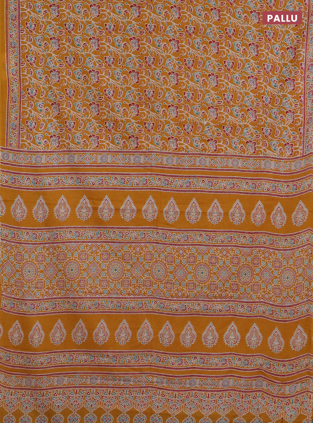 Muslin cotton saree mustard yellow with allover kalamkari prints and printed border