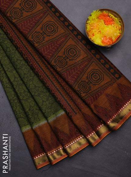 Muslin cotton saree sap green and dark mustard with allover prints and zari woven border