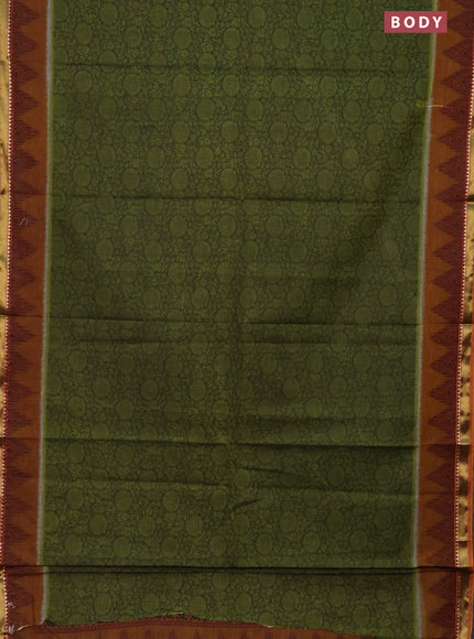 Muslin cotton saree sap green and dark mustard with allover prints and zari woven border