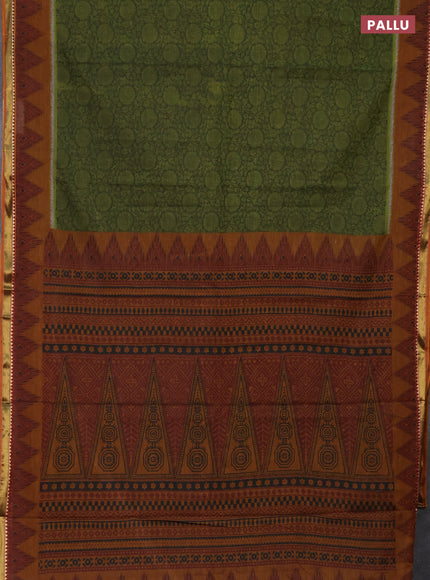 Muslin cotton saree sap green and dark mustard with allover prints and zari woven border
